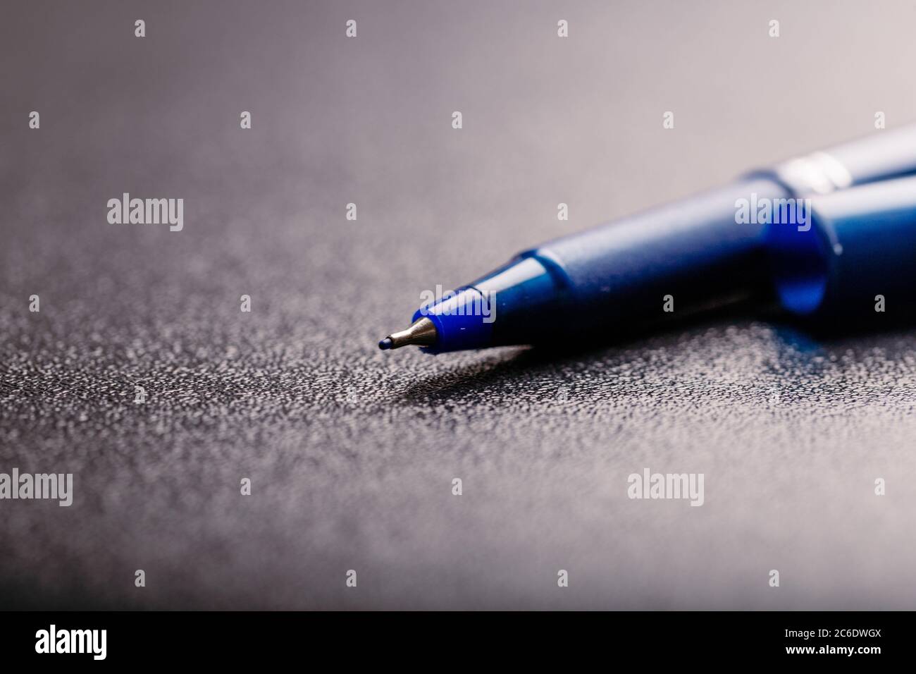automatic plastic ballpoint pen with clipping path on black background. close up. Stock Photo