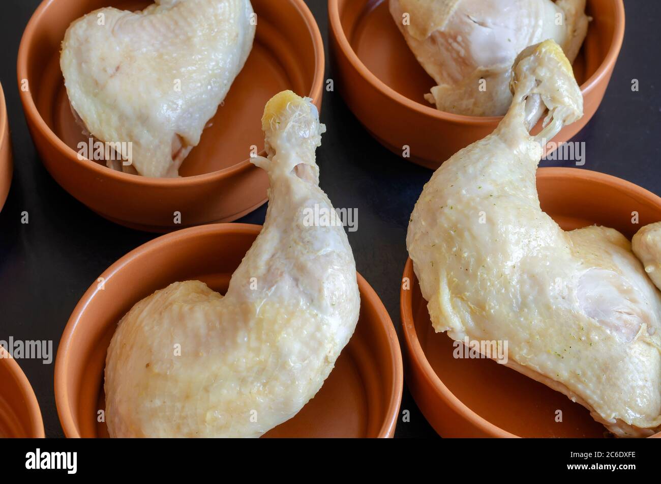 Boiled Chicken Leg Quarters Portions Of Chicken Legs Spread Out In Clay Bowls Ready To Be Consumed Close Up Selective Focus Stock Photo Alamy