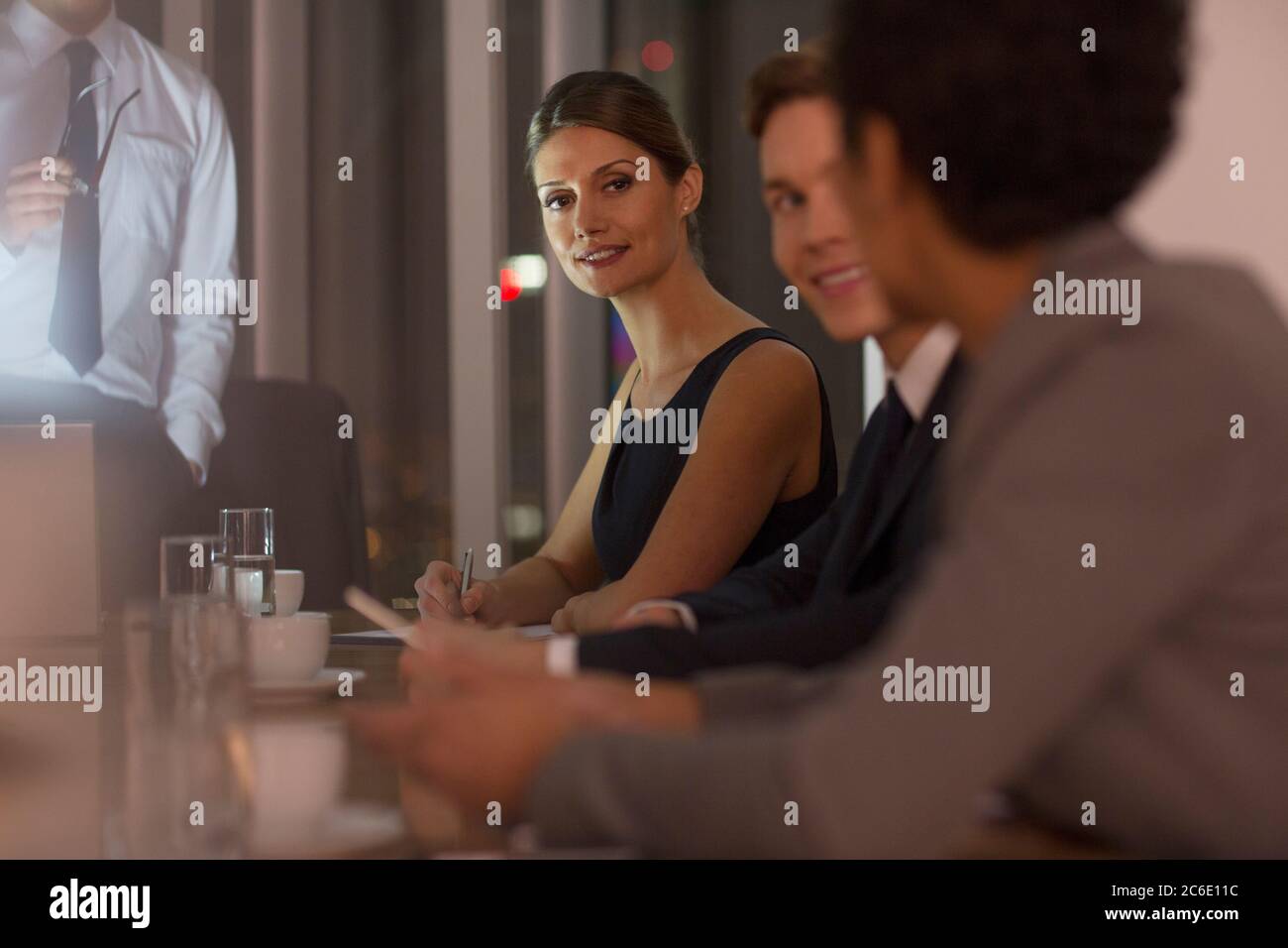 Business people meeting in conference room at night Stock Photo