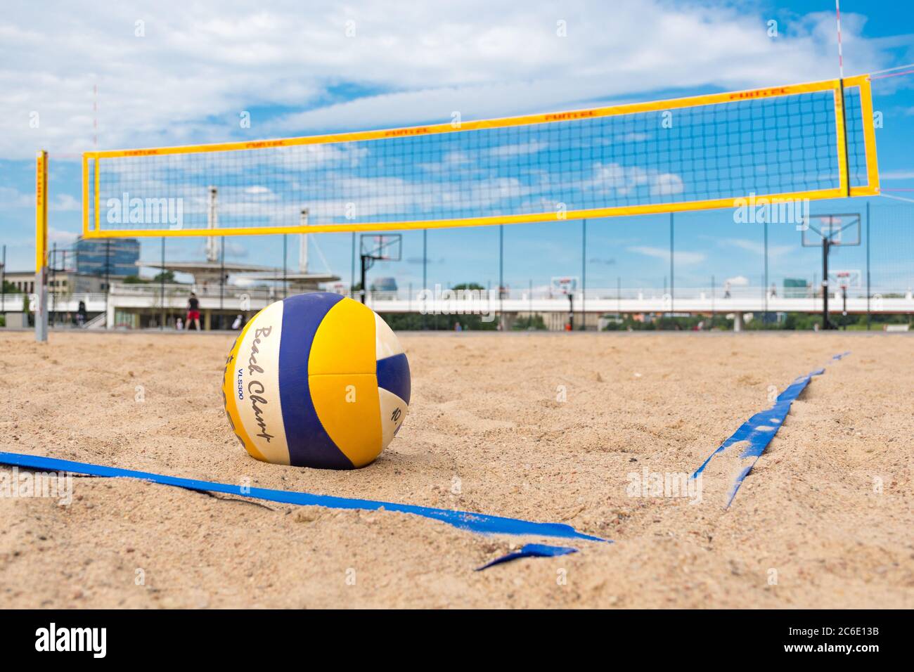 Beach volley, ball on the sand and net on background Stock Photo - Alamy