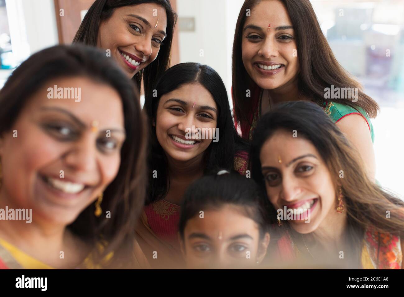 Portrait happy Indian women with bind forehead jewels Stock Photo