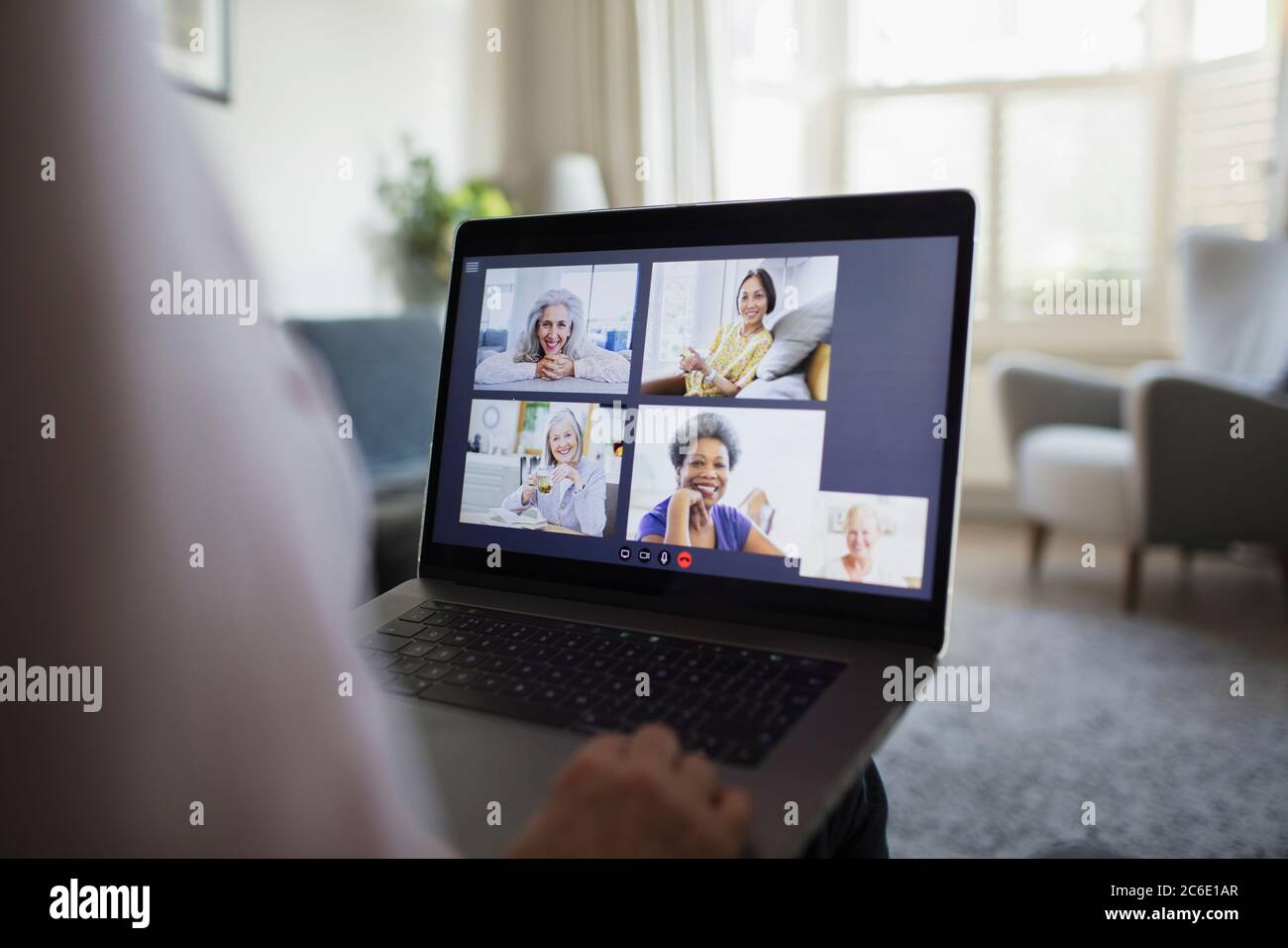 Senior women video conferencing on laptop screen Stock Photo