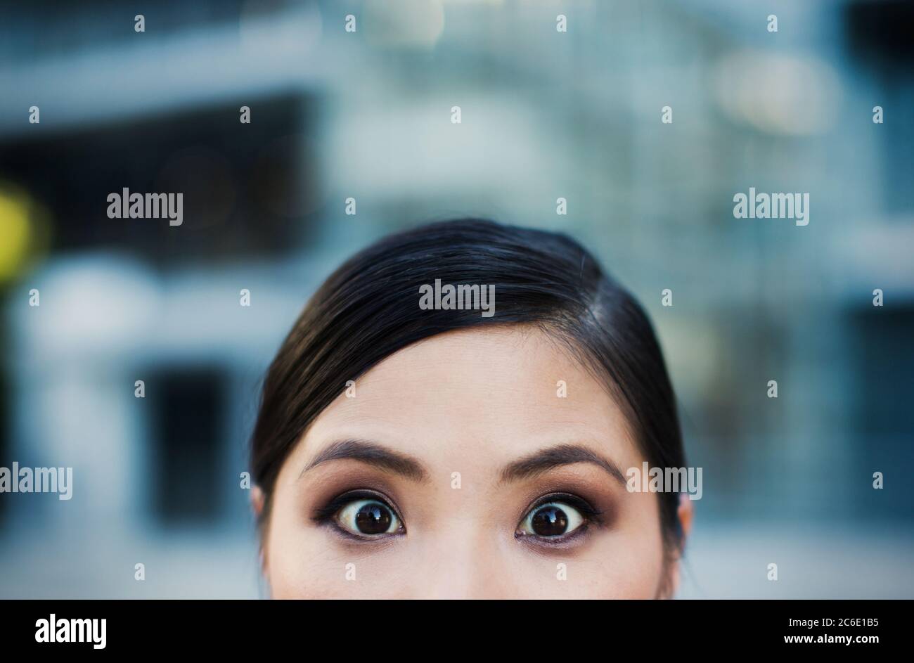 Close up of wide-eyed woman Stock Photo