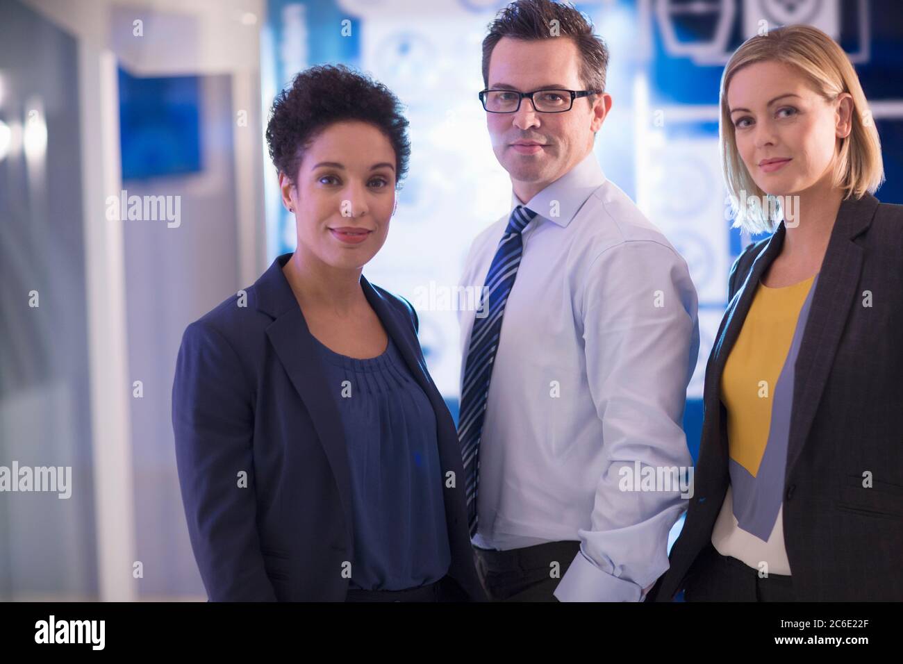 Portrait of smiling business people Stock Photo - Alamy