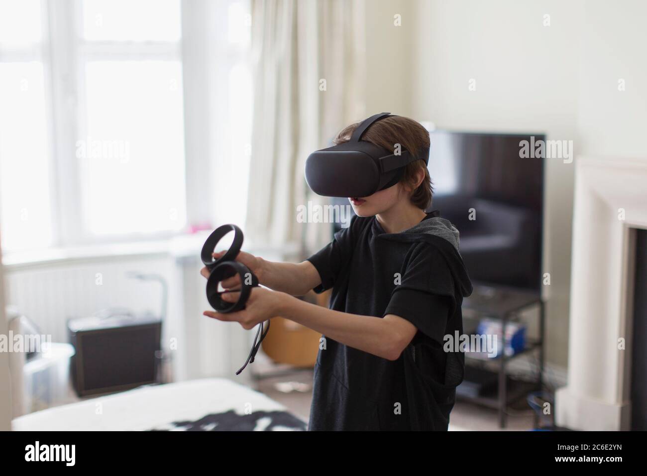 Boy playing on computer in hi-res stock photography and images - Alamy