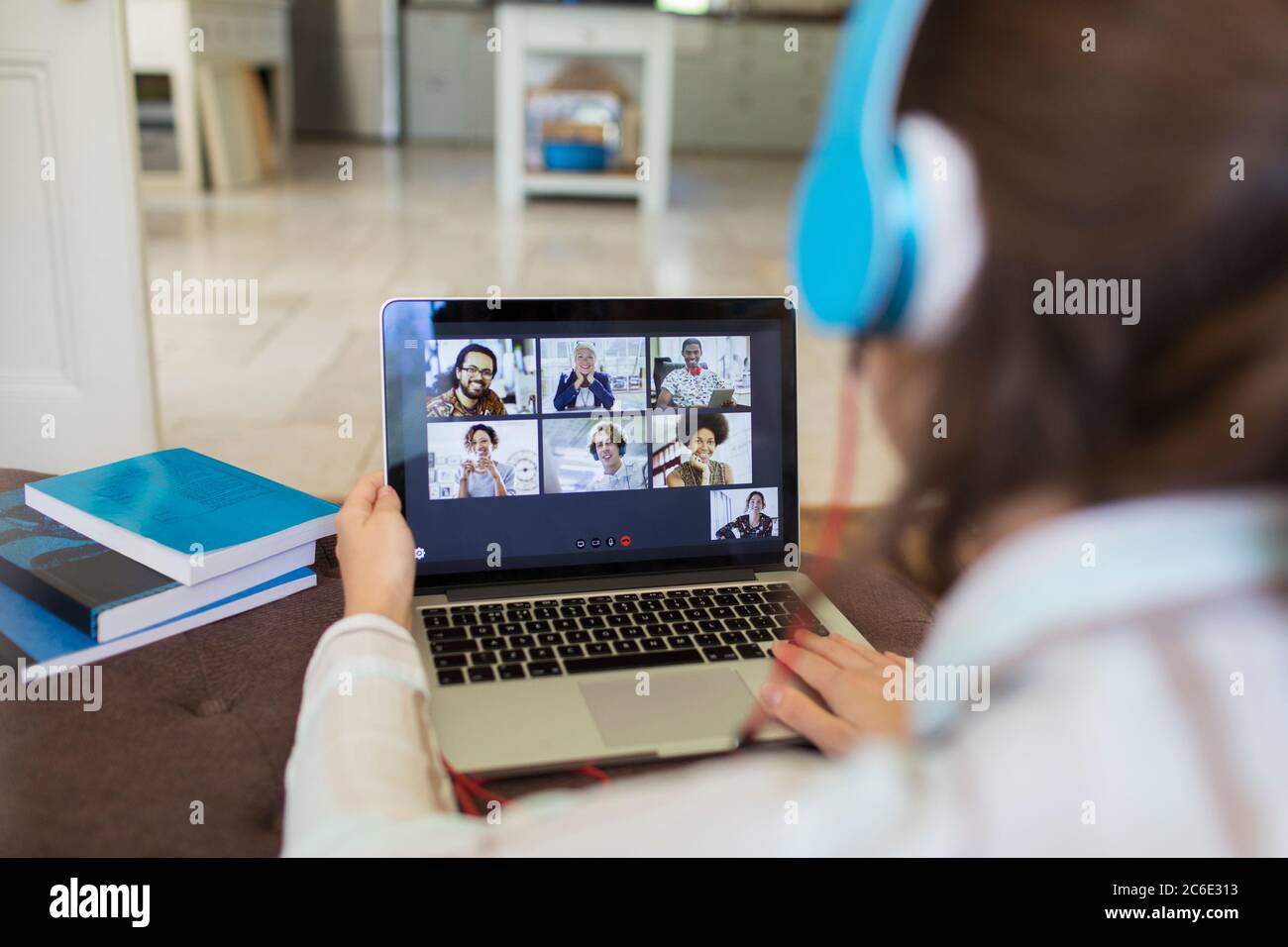 Colleagues video chatting on laptop screen Stock Photo