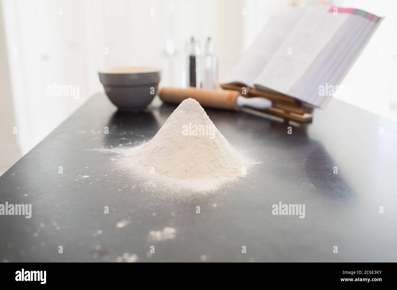 Flour heap on kitchen counter Stock Photo