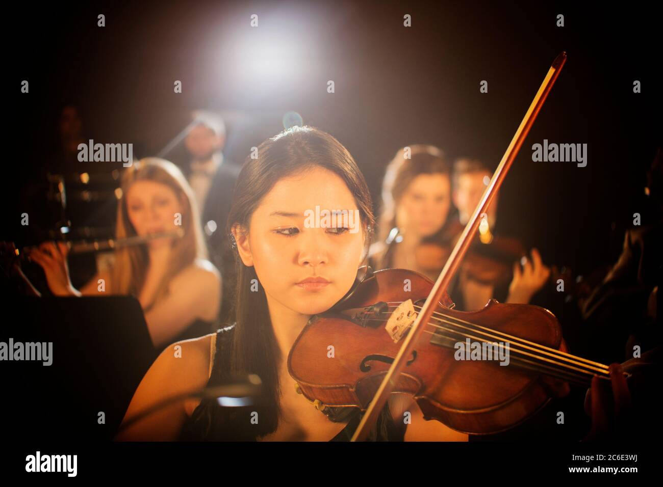 Violinist performing in orchestra Stock Photo Alamy
