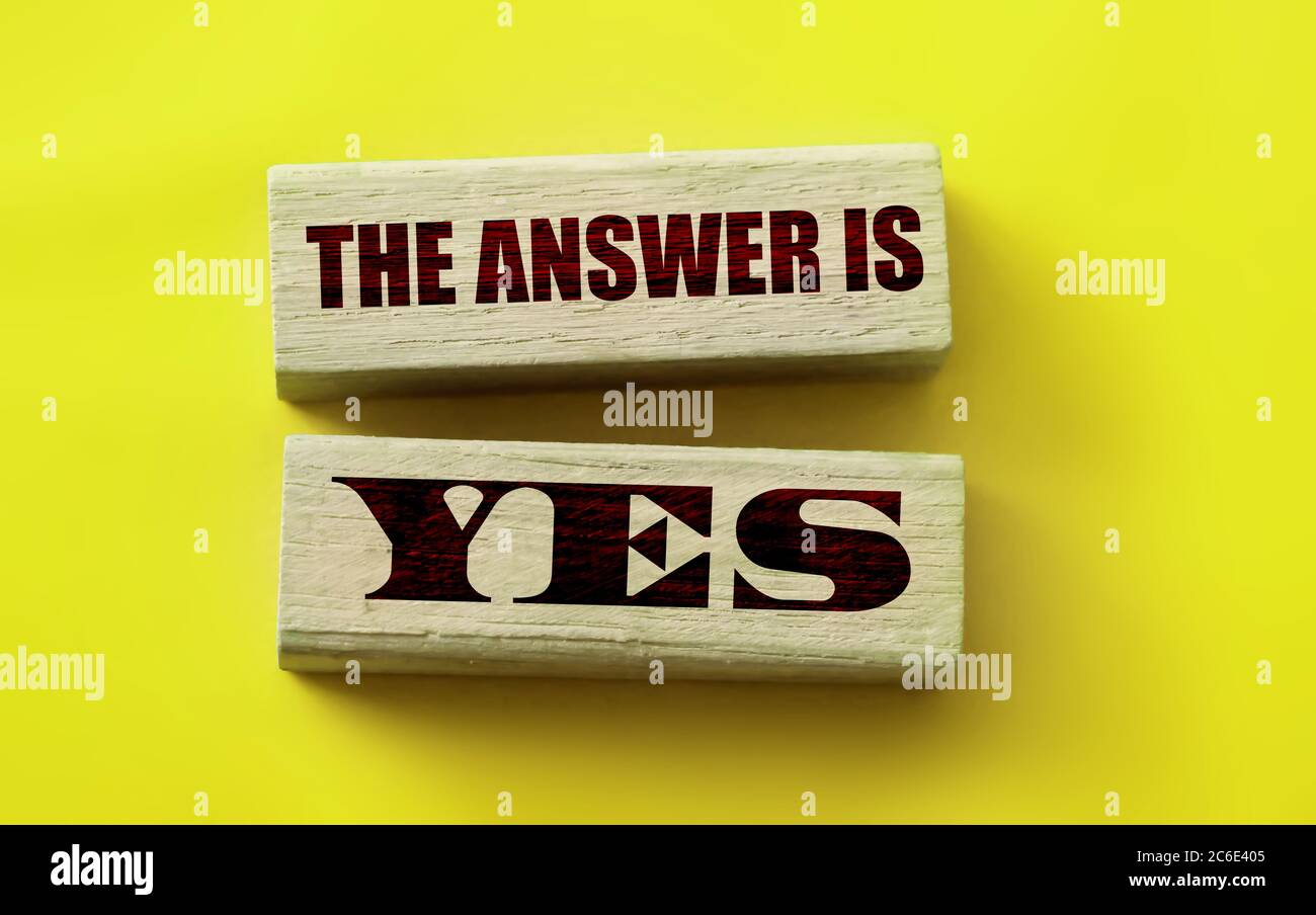 The answer is YES words on wooden blocks. Business,or education concept ...