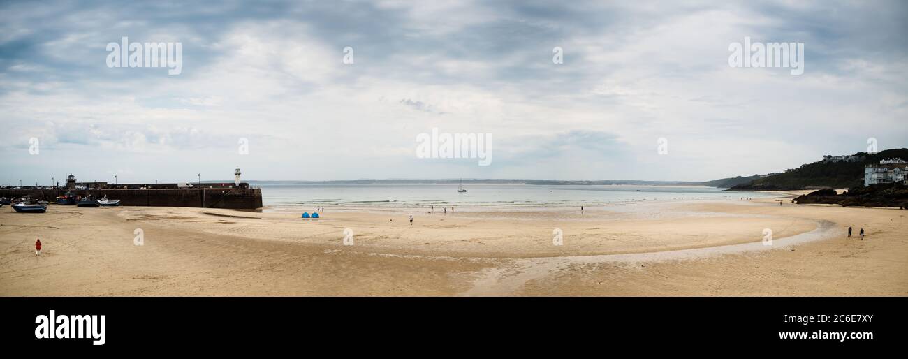 Panorama of Beach in St. Ives at low tide in Cornwall in England. Stock Photo