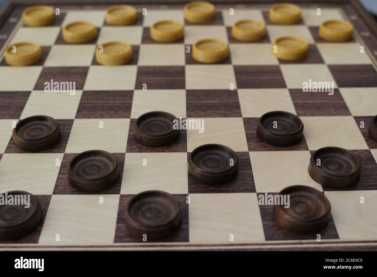 Game of checkers, ancient strategy game consisting of a chessboard and