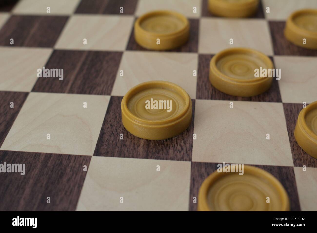 Game of checkers, ancient strategy game consisting of a chessboard and