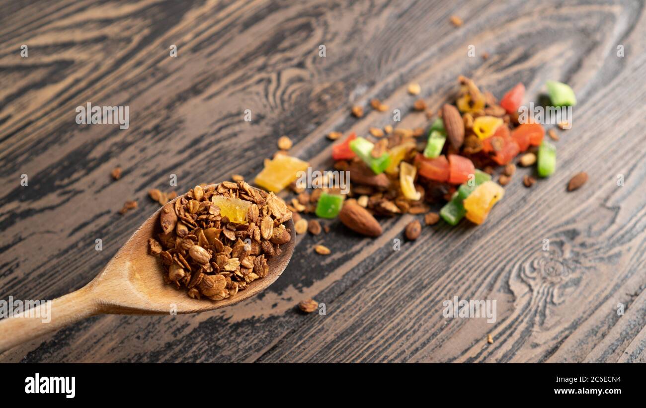 Spoon baked oatmeal with nuts and dried fruits. Advertising backdrop