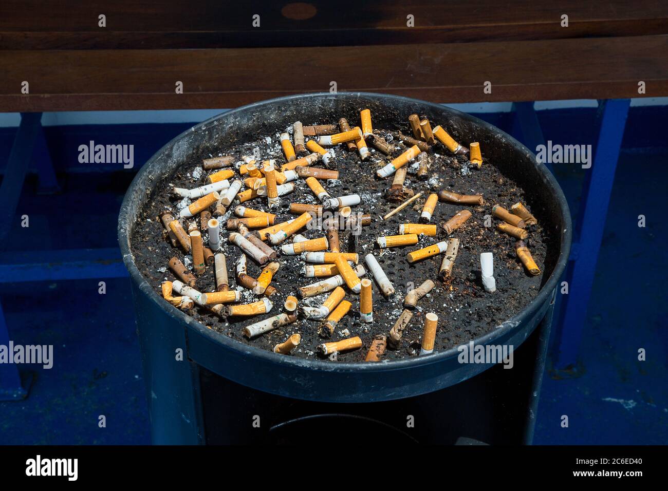 cigarette butt,cigarette but can,cigarette butts or buds,cigarette trash,proper disposal of cigarette butts,ash trays, Stock Photo