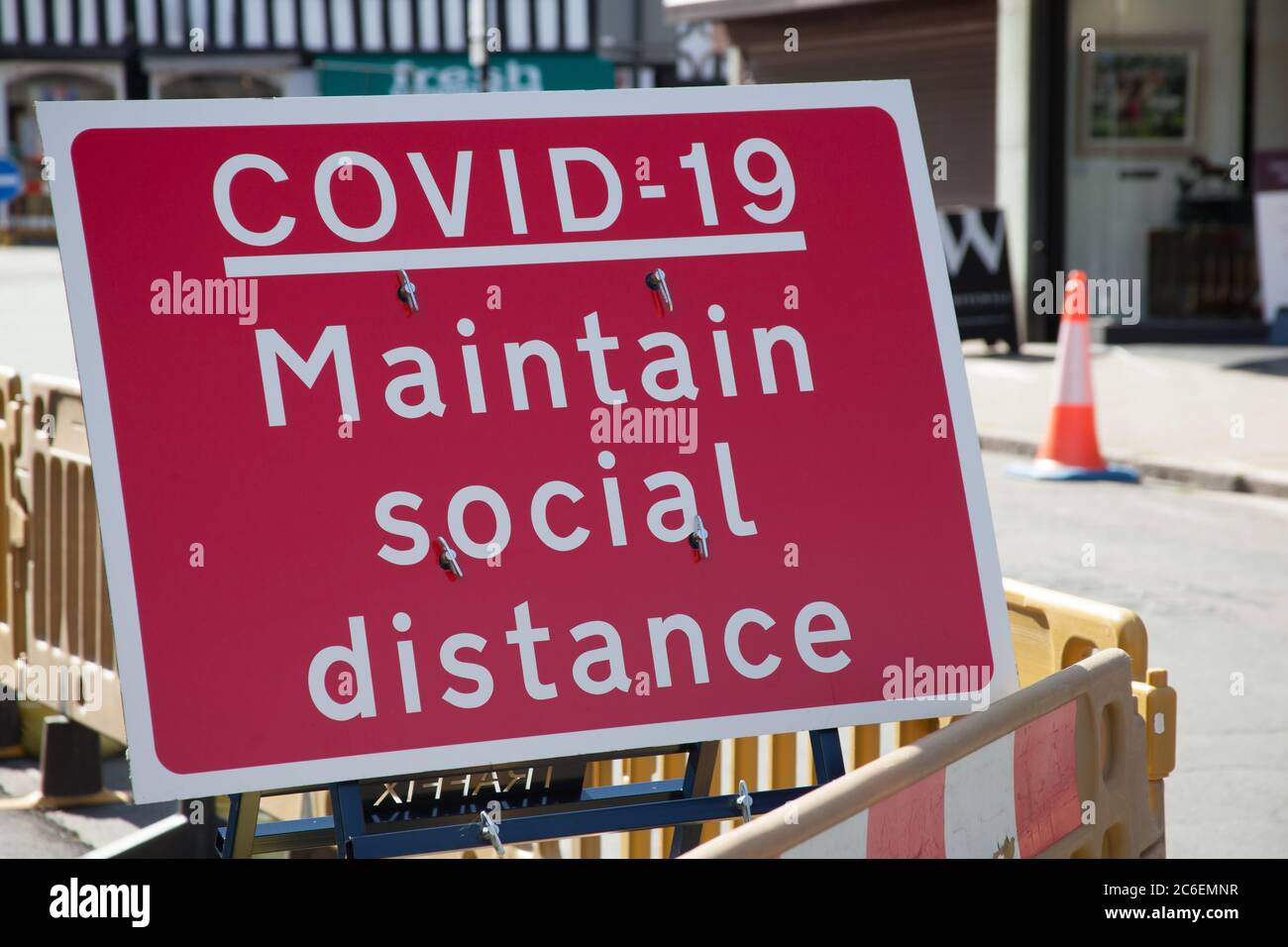 Maintain Social Distance sign for Covid 19 in Stratford upon Avon in Warwickshire in the UK. Taken on 22nd June 2020. Stock Photo