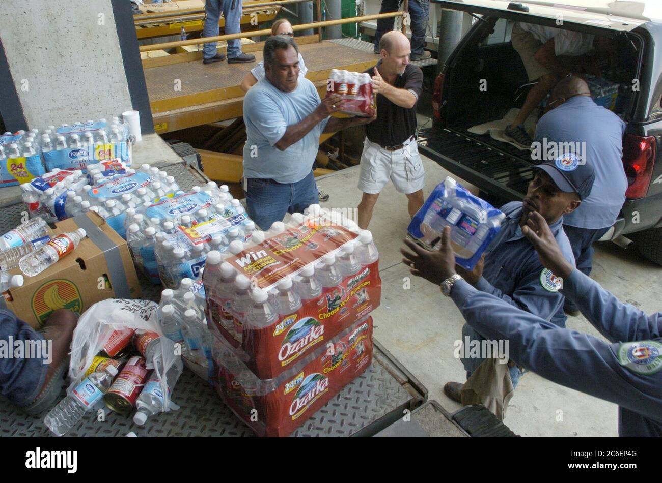 https://c8.alamy.com/comp/2C6EP4G/austin-texas-usa-september-3-2005-refugees-from-hurricane-katrina-continue-to-pour-into-texas-shelters-including-the-austin-convention-center-which-is-expecting-over-5000-people-in-the-next-three-days-city-of-austin-employees-unload-bottled-water-for-evacuees-bob-daemmrich-2C6EP4G.jpg
