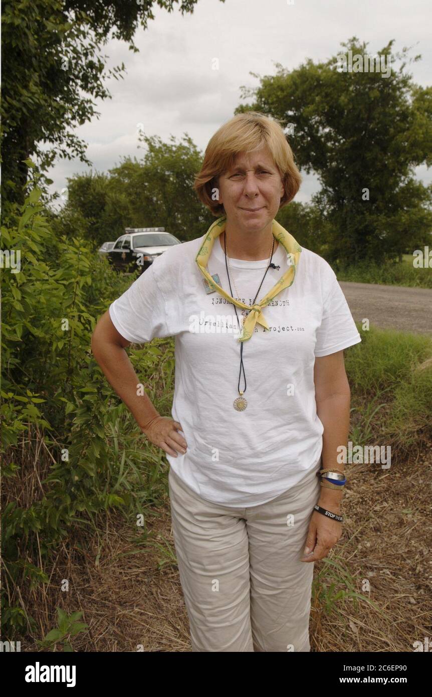 Crawford, Texas August 28, 2005:  Anti-war activist Cindy Sheehan stands at a blockade on the road leading to the ranch of  U.S. President George W. Bush about 10 miles out of Crawford. Sheehan, whose son Casey died in action in Iraq in 2004, has organized a series of protests near the Bushes' Texas ranch during the president's summer vacation there.  ©Bob Daemmrich Stock Photo