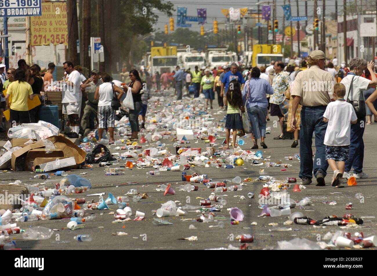 San Antonio, Texas USA, April 22 2005: Annual Battle of the Flowers parade winds through downtown during Fiesta celebration. The event attracts 300,000 viewers. Trash fills downtown street after parade ends. ©Bob Daemmrich Stock Photo