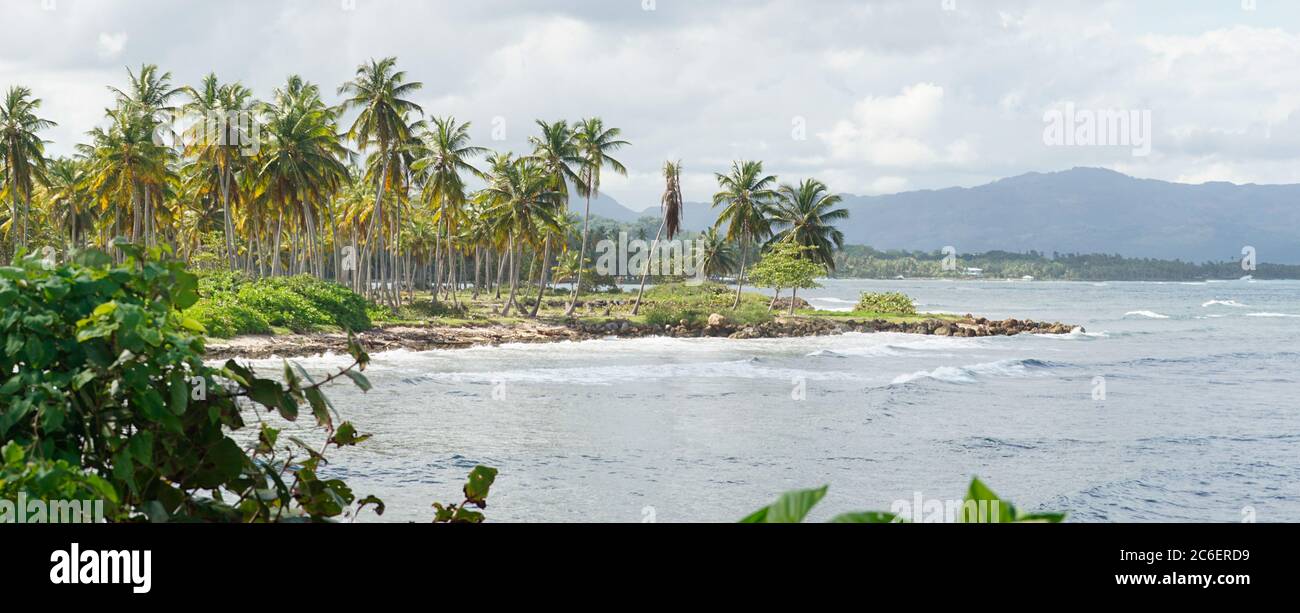 Tropical Beach and Ocean island setting in Samana, Dominican Republic. Stock Photo