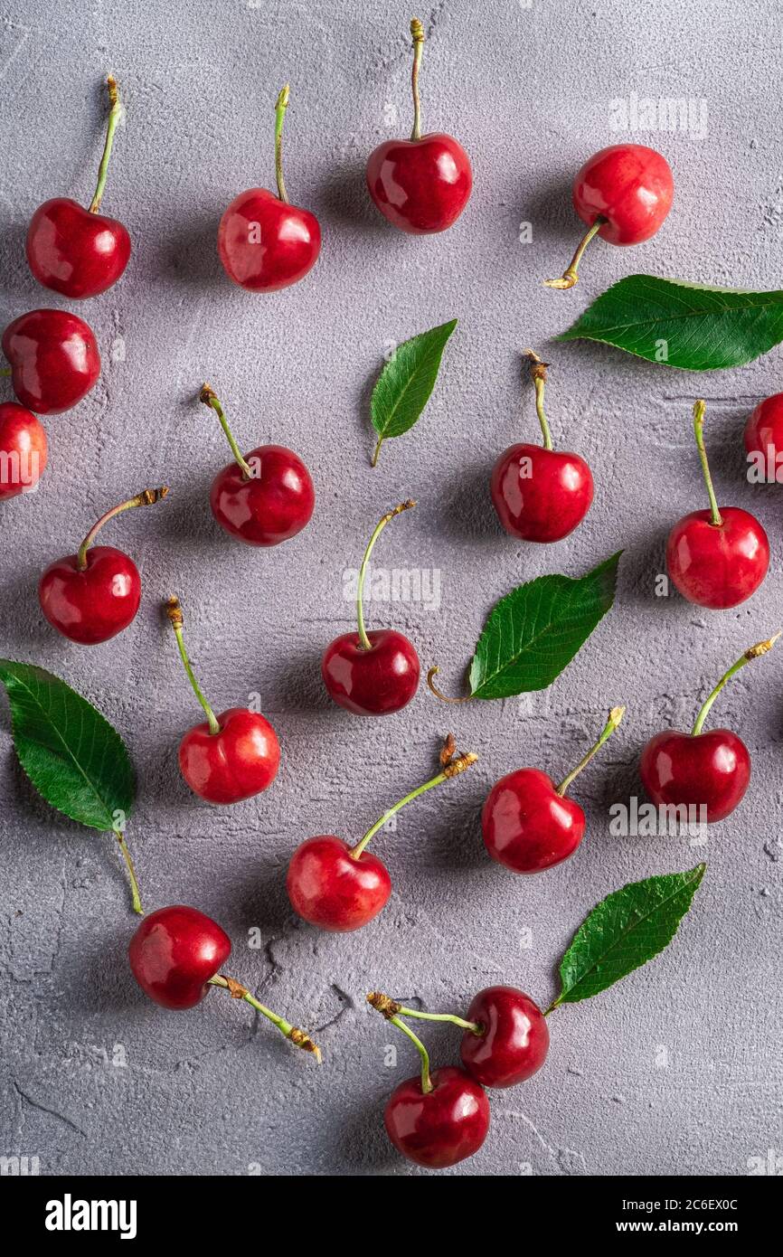 Cherry fruits with leaves hi-res stock photography and images - Alamy