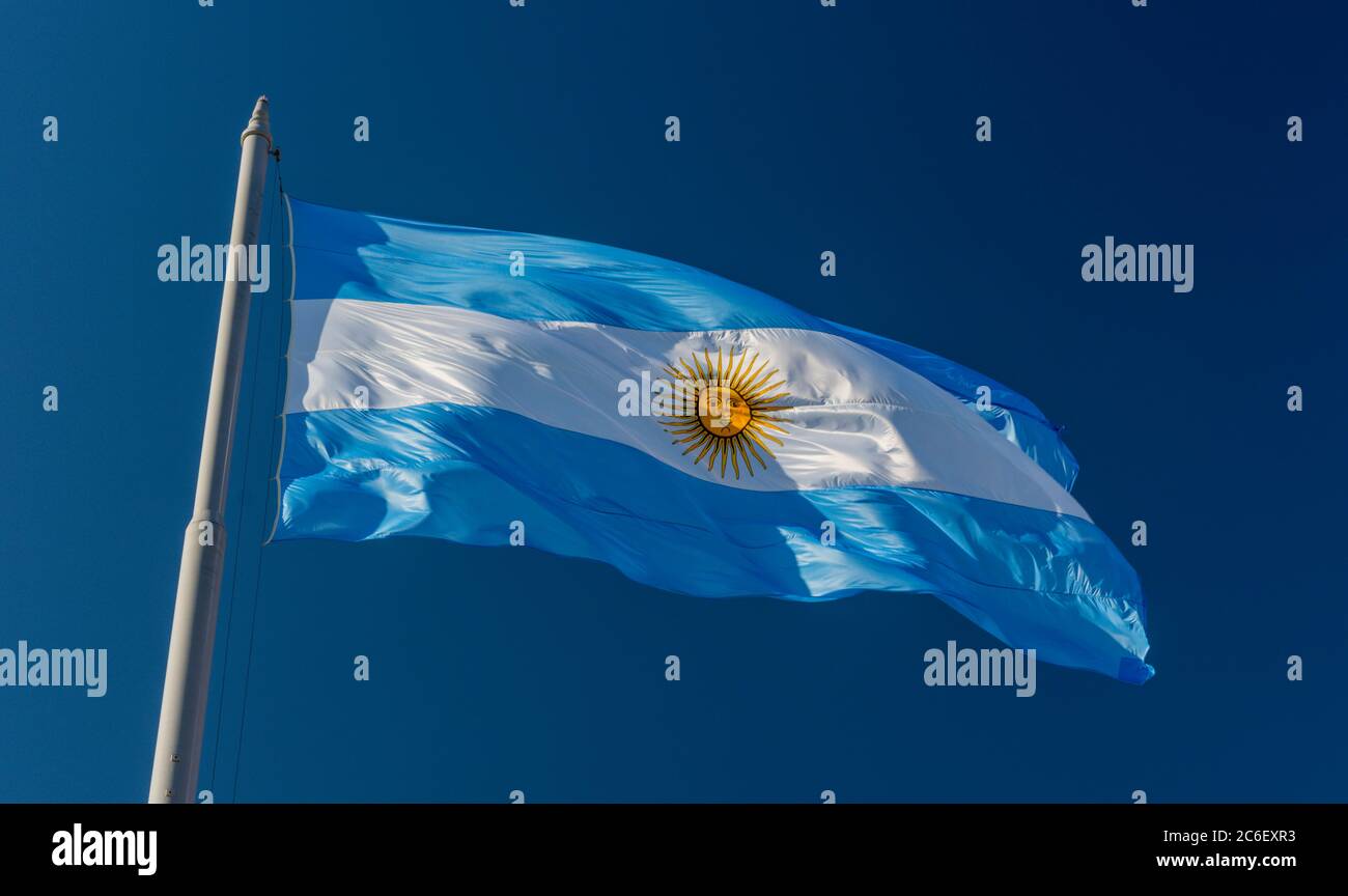 Flag of Argentina blowing in the wind on Plaza de Mayo, Buenos Aires, Argentina Stock Photo