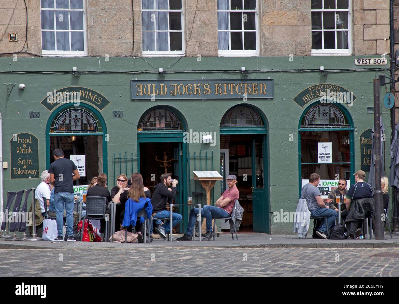 Edinburgh, Scotland, UK. 9 July 2020. 17 degrees and sunshine encouraging  people to get out to dine and drink in the city centre at the various pop  up cafes at Waverley Mall