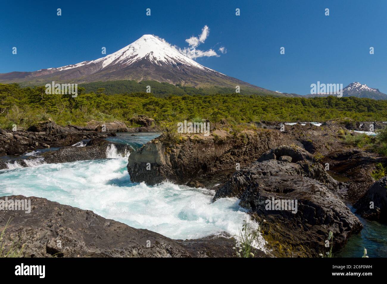View of Saltos del Rio Petrohue and Volcan Osorno near Petrohue in the Andes in Chile Stock Photo