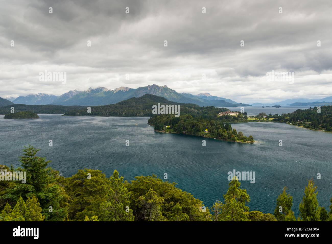 View across Lago Moreno and Lago Nahuel Huapi towards Villa Llao Llao in the Argentinian lake district near Bariloche Stock Photo