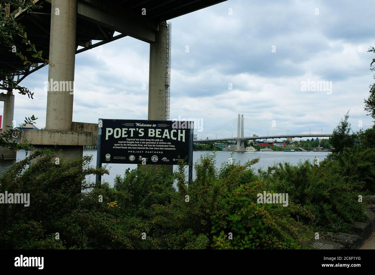Sign at Poet's Beach, beneath Marquam Bridge near the Waterfront District and downtown Portland, Oregon; Willamette River. Stock Photo