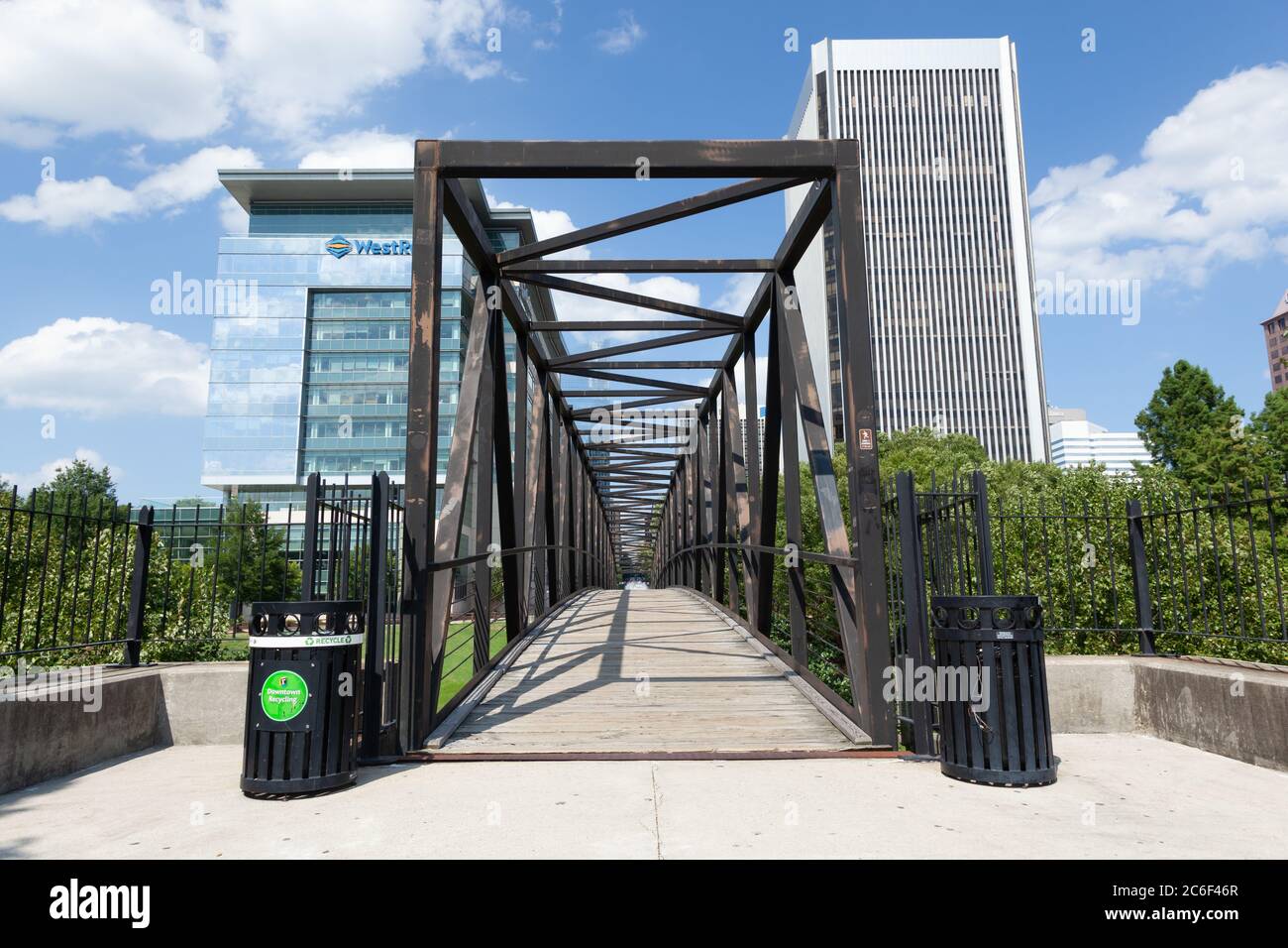 RICHMOND, VIRGINIA - August 8, 2019: a footbridge crosses the James River canal going to Brown's Island Stock Photo