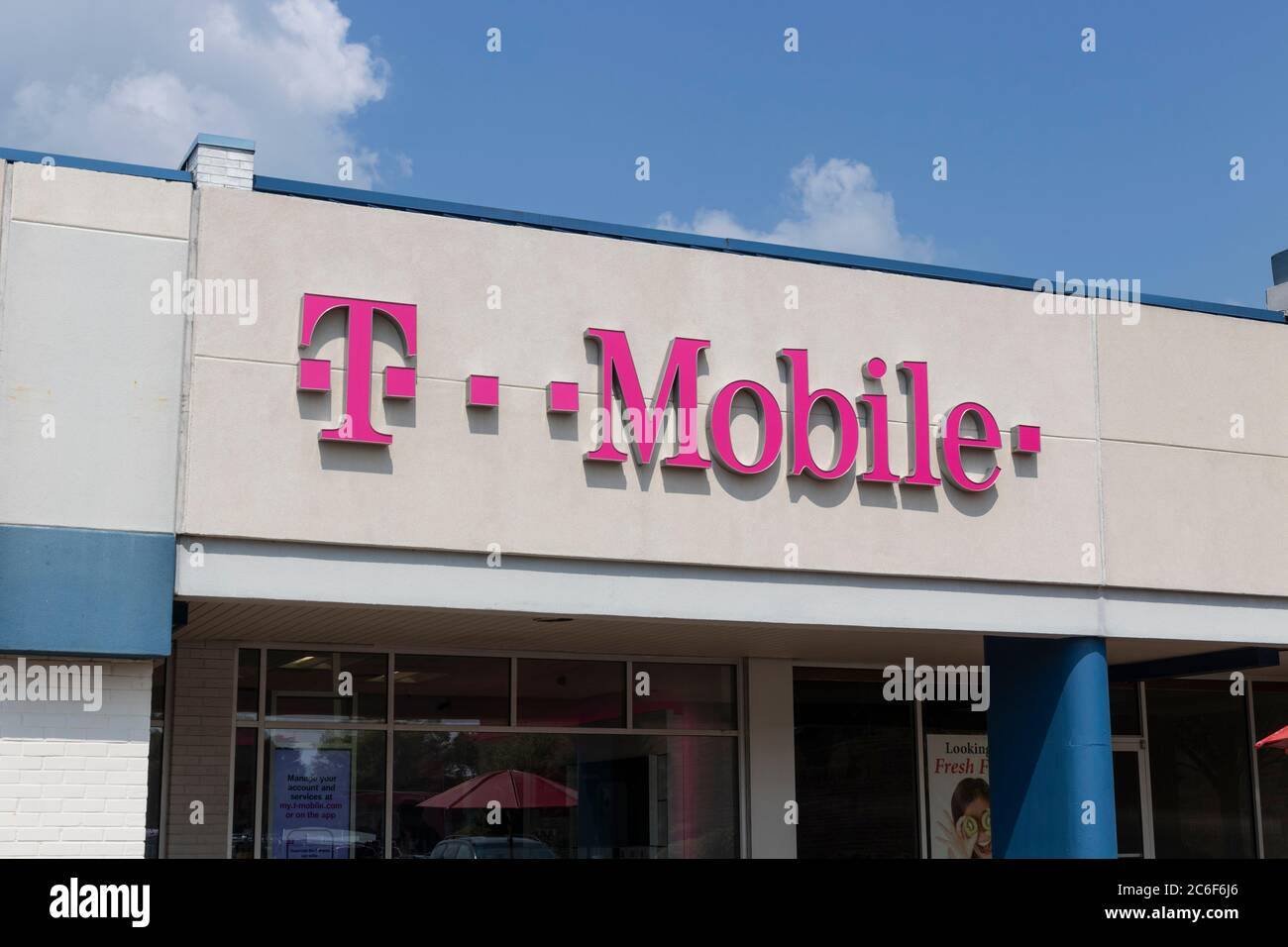 Indianapolis - Circa July 2020: T-Mobile Retail Wireless Store. T-Mobile will merge with Sprint in hopes of advancing 5G development. Stock Photo
