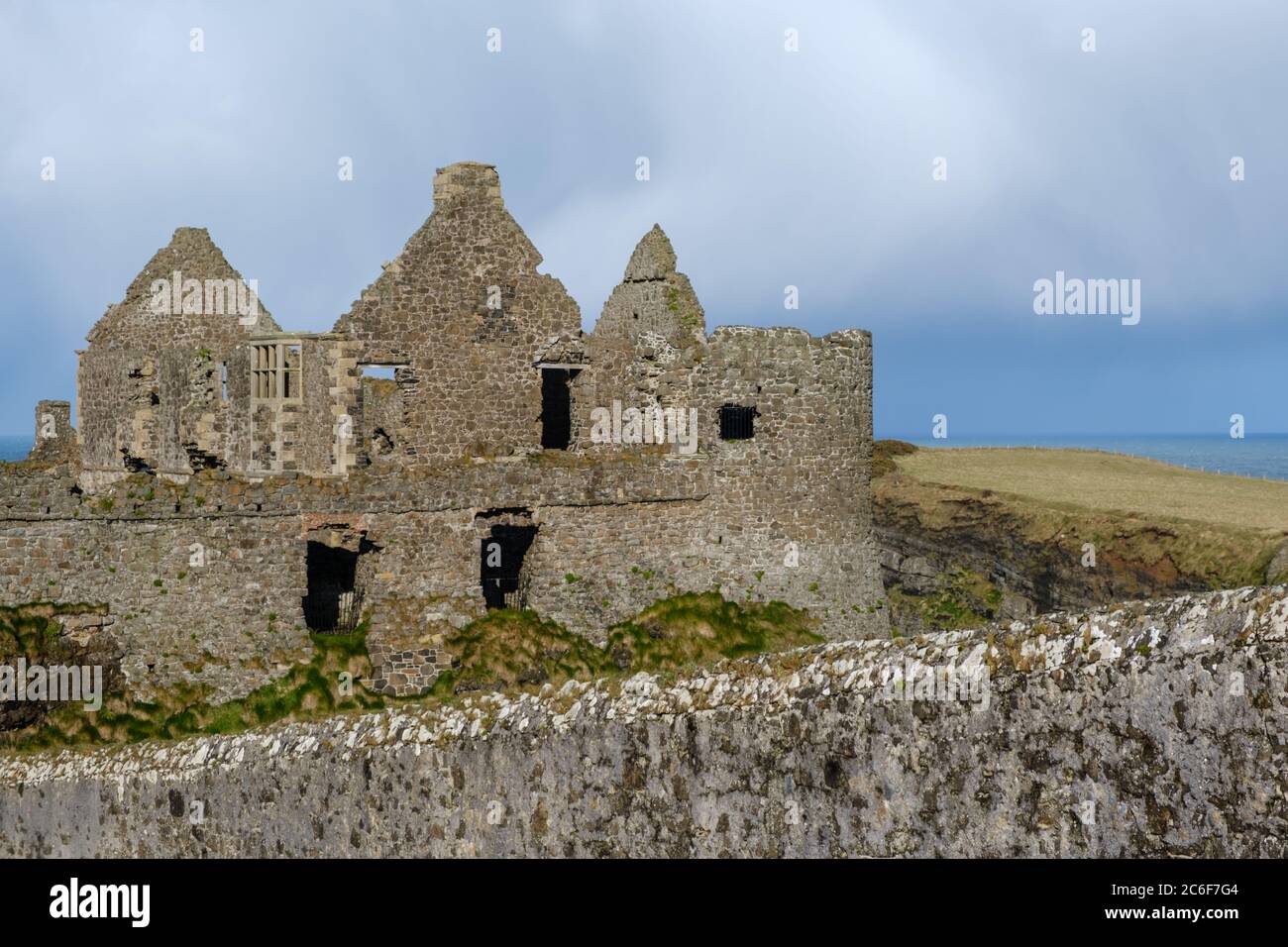 The ruins of Dunluce Castle at Dunluce near Portrush in County Antrim, Northern Ireland. Dunluce was used in TV series Game of Thrones as a location Stock Photo