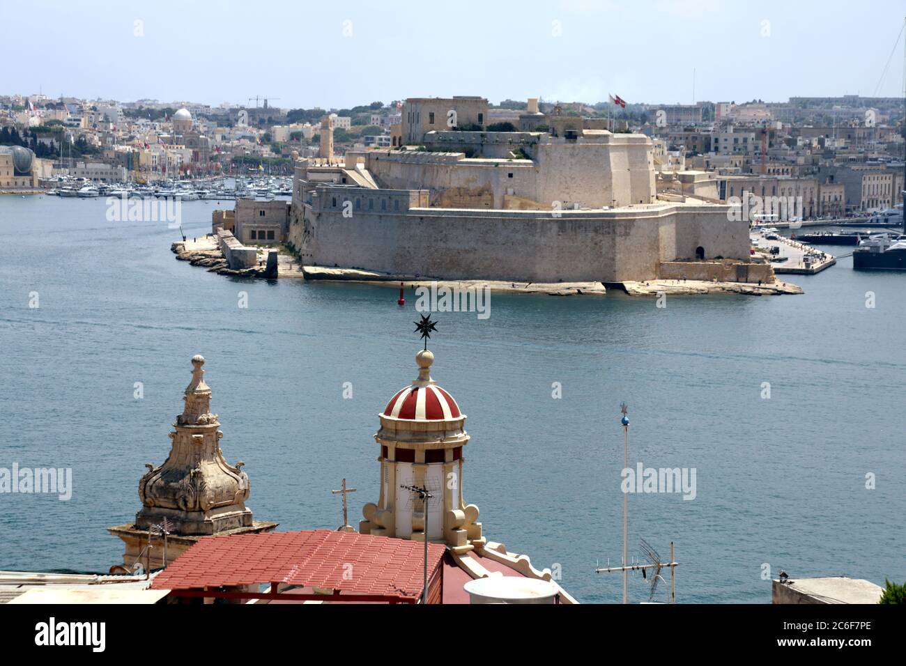 Birgu (Vittoriosa). Malta. Fort San Angelo seen over the Grand Harbour. A view from Valletta waterfront. Stock Photo