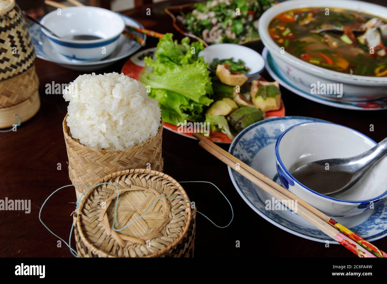 LAO PDR, fish soup and sticky rice / Laos, Fischsuppe und Klebreis Stock Photo