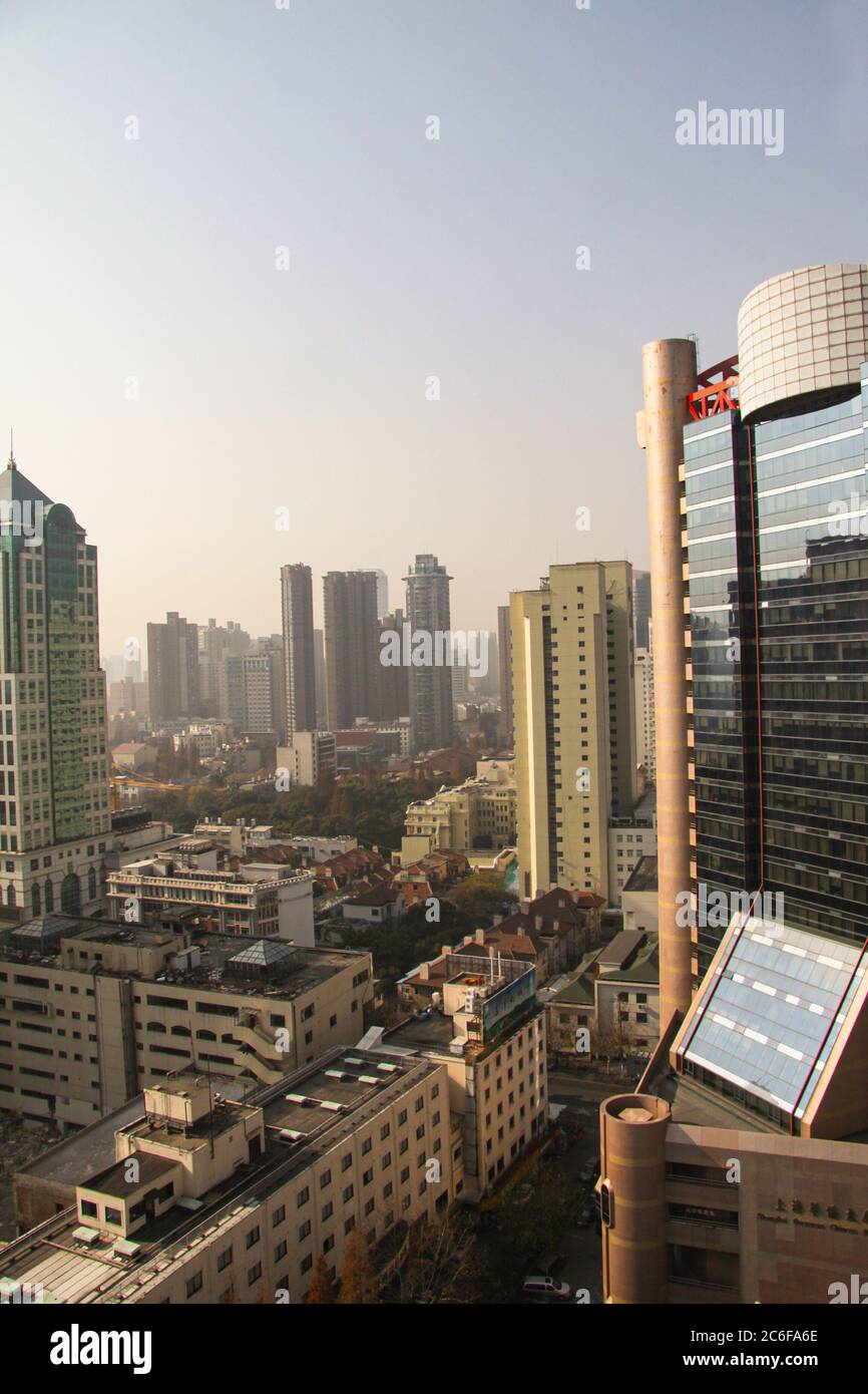 Shanghai skyline seen from above with highrise buildings and blue sky. Shanghai, China - December 30, 2014. Stock Photo