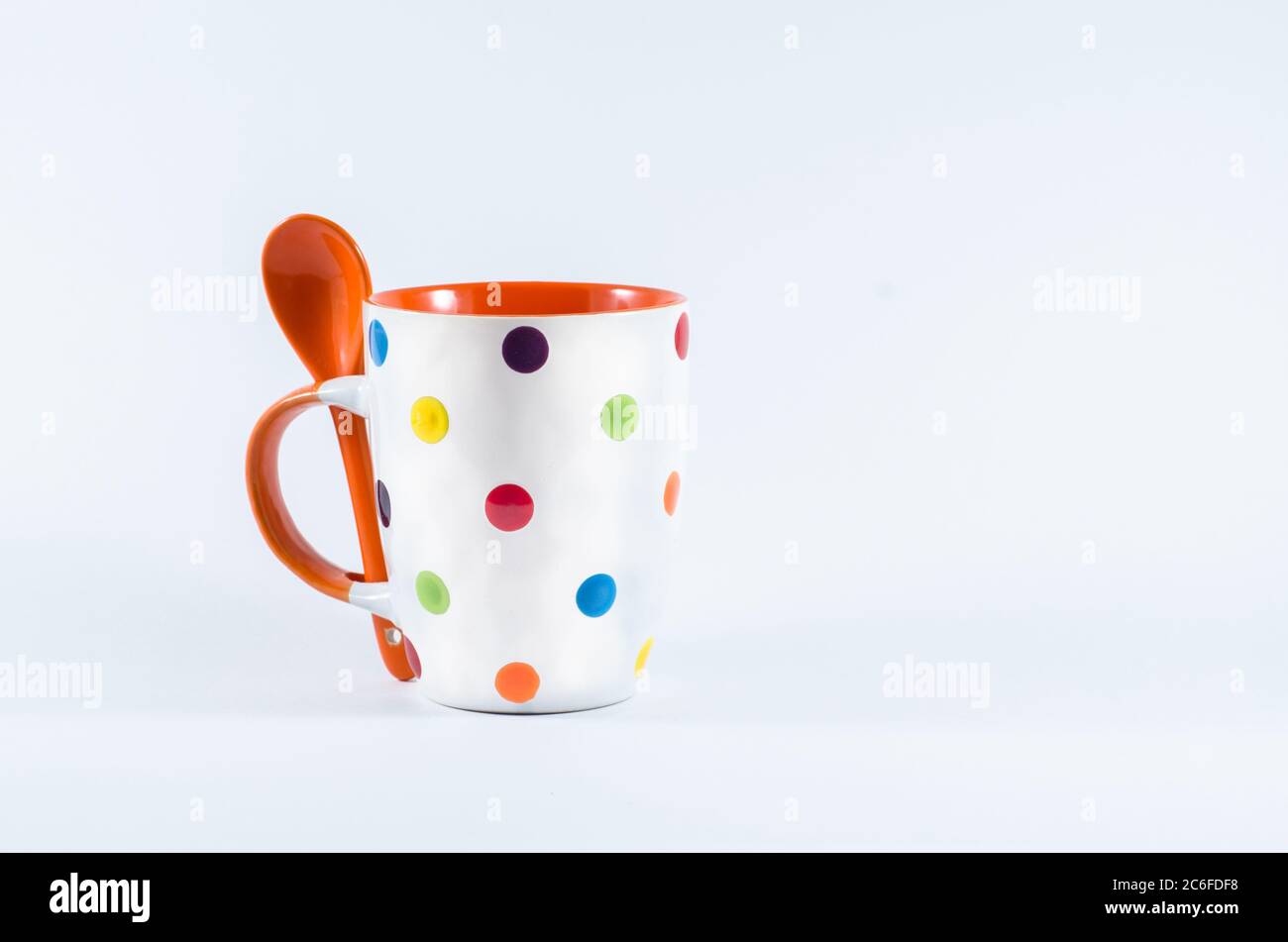 Beautiful Coffee Mug with colorful spots Stock Photo