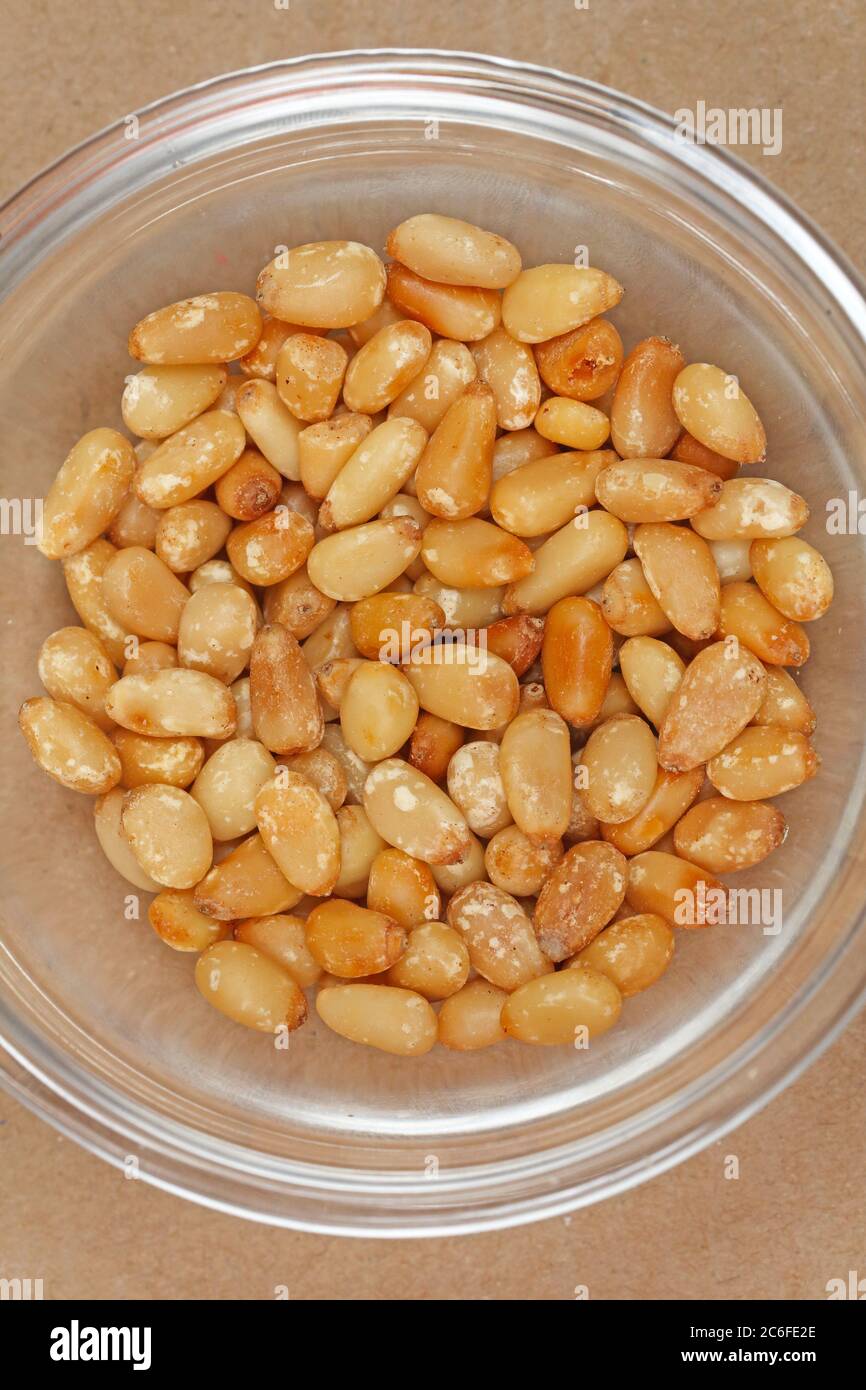 Pine Nuts Snacks in Small Glass Bowl Stock Photo