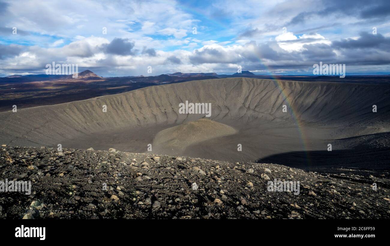 picturesque moon landscape view with a rainbow from hverfjall volcano over to the area of myvatn in iceland Stock Photo