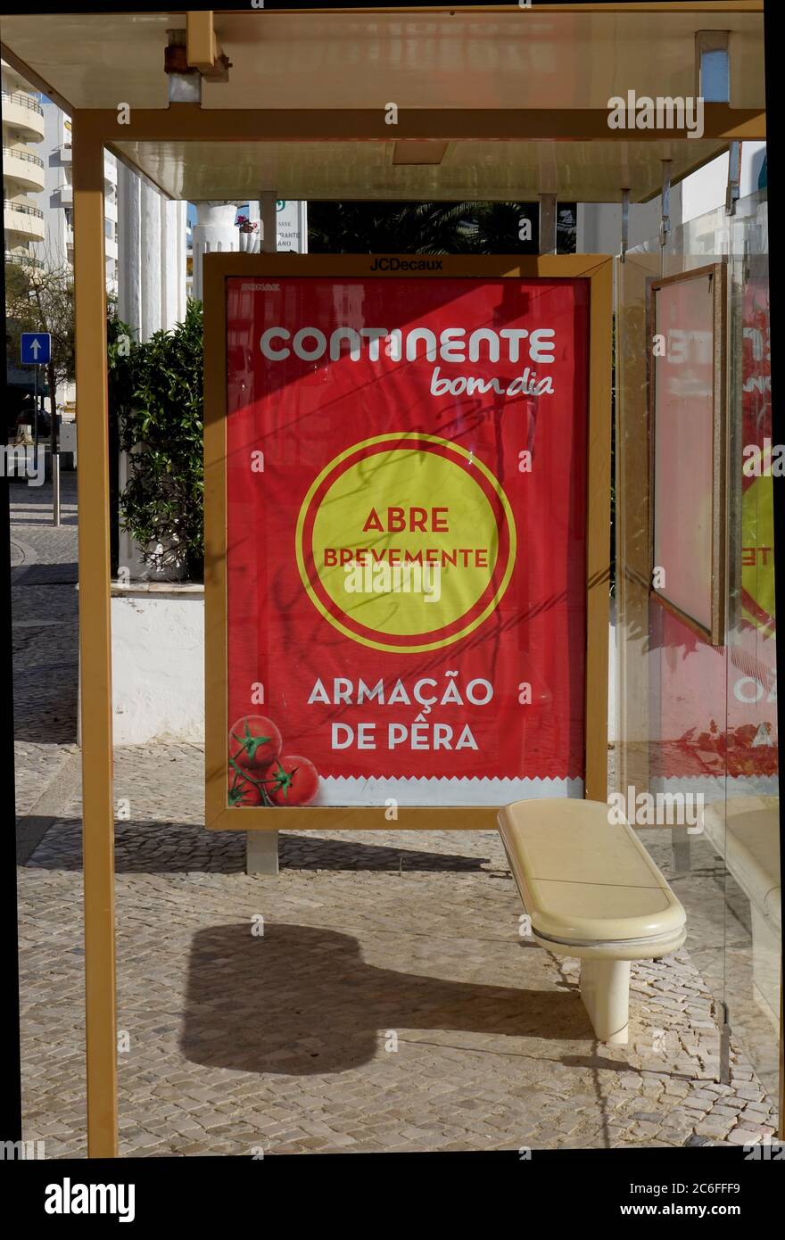 Bus Stop Shelter In Armacao De Pera With An Advertising Poster For Continente Supermarkets The Algarve Portugal Stock Photo