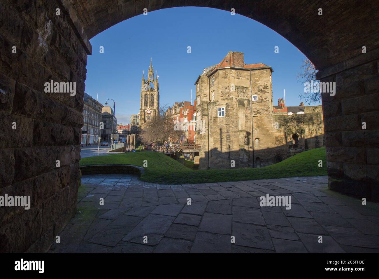 The Black Gate, Newcastle-Upon-Tyne, Castle viewed through the stone railway arch creating an suitably strong frame Stock Photo