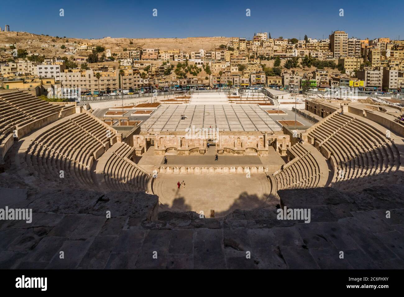 Amman, Jordan - November 2nd, 2011: View over the ancient Roman Theatre and Amman Downtown to the hill with the ancient Roman Citadel Stock Photo