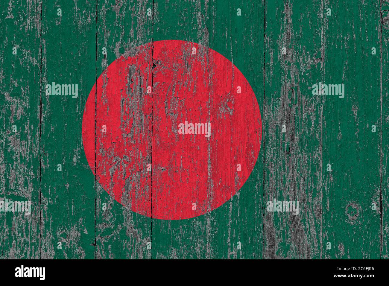 Bangladesh flag on grunge scratched wooden surface. National vintage background. Old wooden table scratched flag surface. Stock Photo