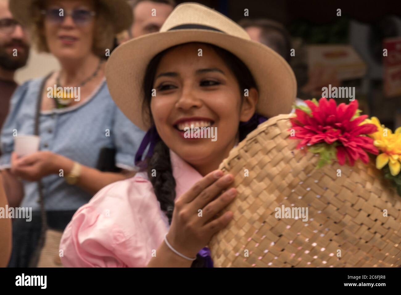 Villach, Austria - August 3th, 2019: A smiling lady from Ecuador at the Villacher Kirchtag, the largest traditional festival in Austria Stock Photo