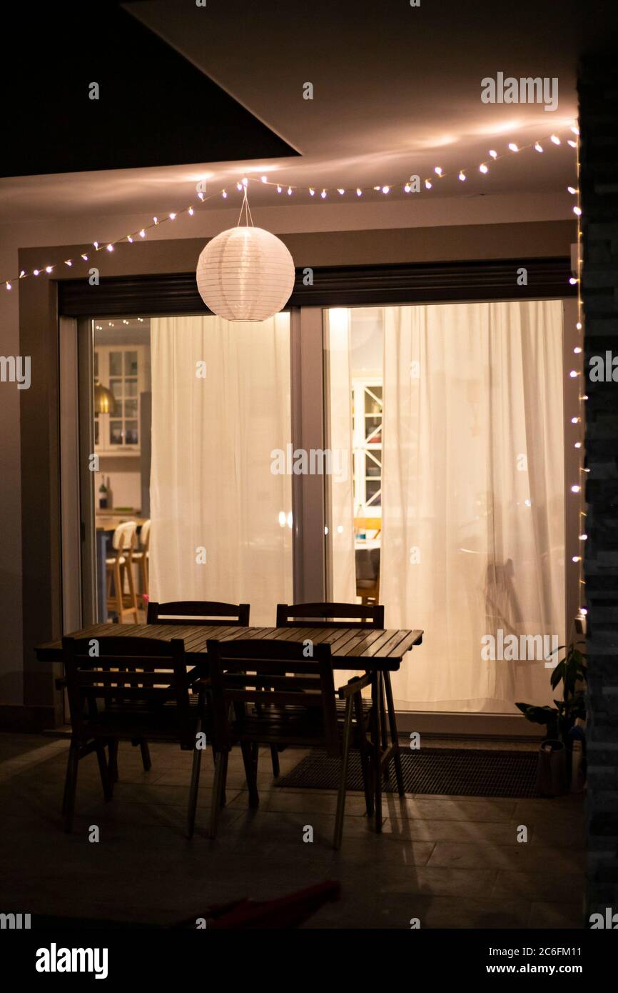 Outdoor string lights in balcony hi-res stock photography and