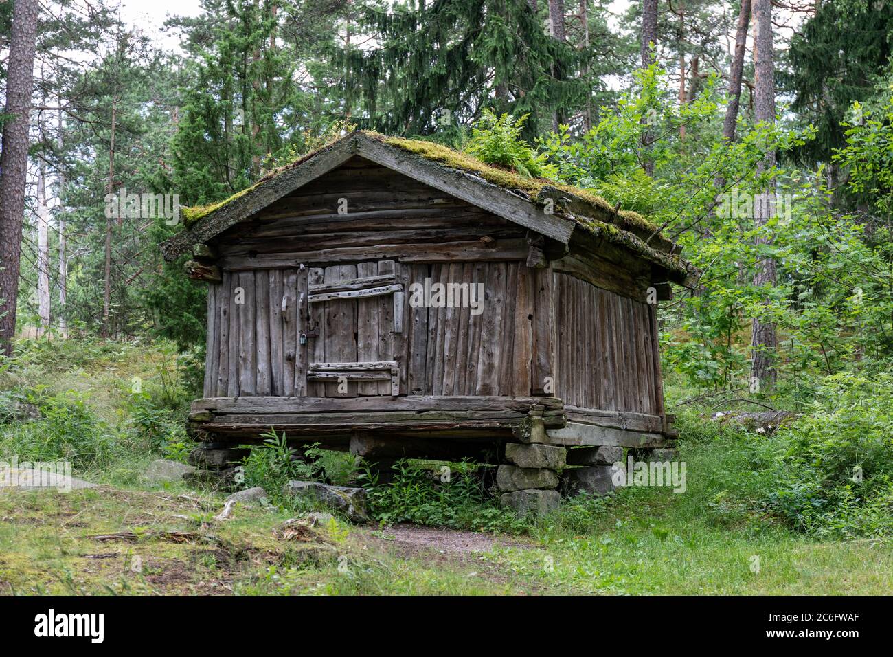 Old wooden storehouse from Nuorgam in Seurasaari Open-Air Museum in Helsinki, Finland Stock Photo