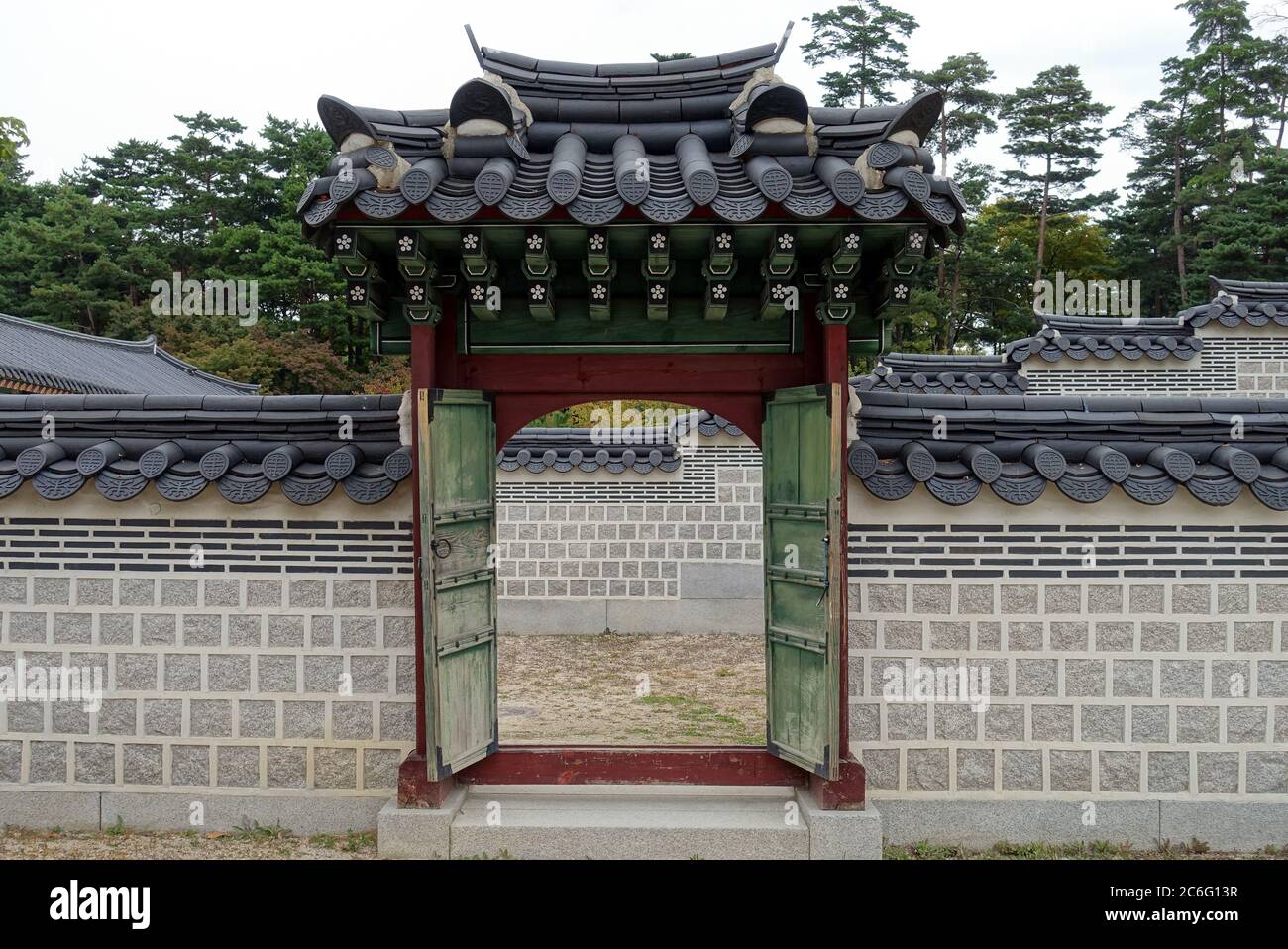Ornate entrance with gates to walled City in Seoul South Korea Stock