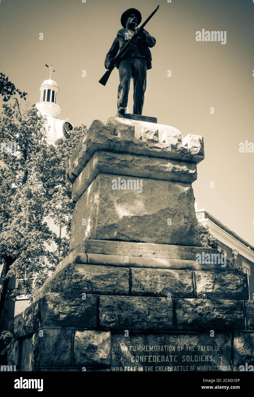 A commemorative Confederate Solider Statue on plinth base with plaque dedication to fallen confederate soldiers at the Rutherford County Courthouse in Stock Photo
