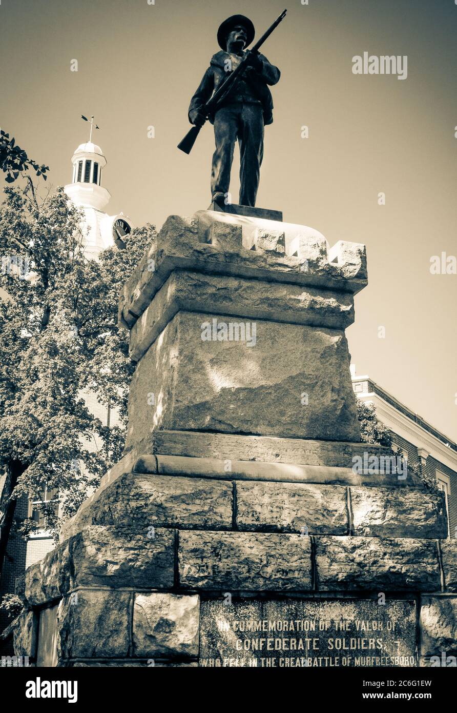 A commemorative Confederate Solider Statue on plinth base with plaque dedication to fallen confederate soldiers at the Rutherford County Courthouse in Stock Photo