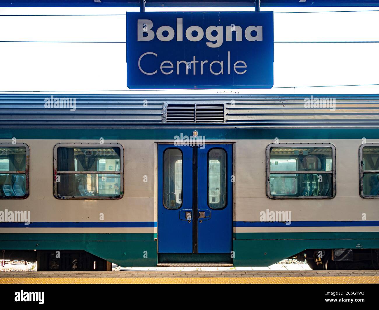 Train stationary at the platform of Bologna Centrale station.Italy Stock Photo