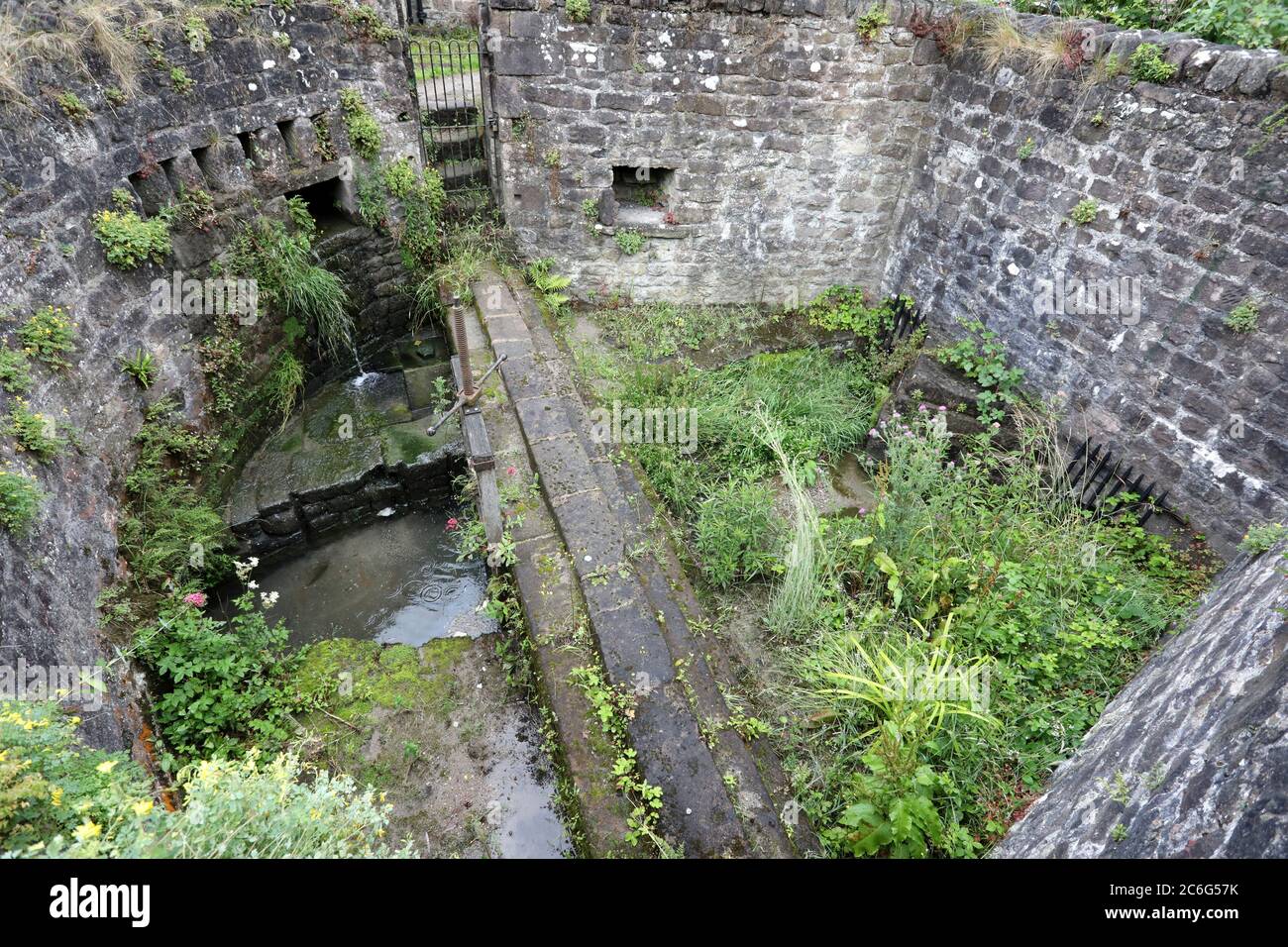 Historic water control structure at Cromford in the Derwent Valley known as The Bear Pit Stock Photo
